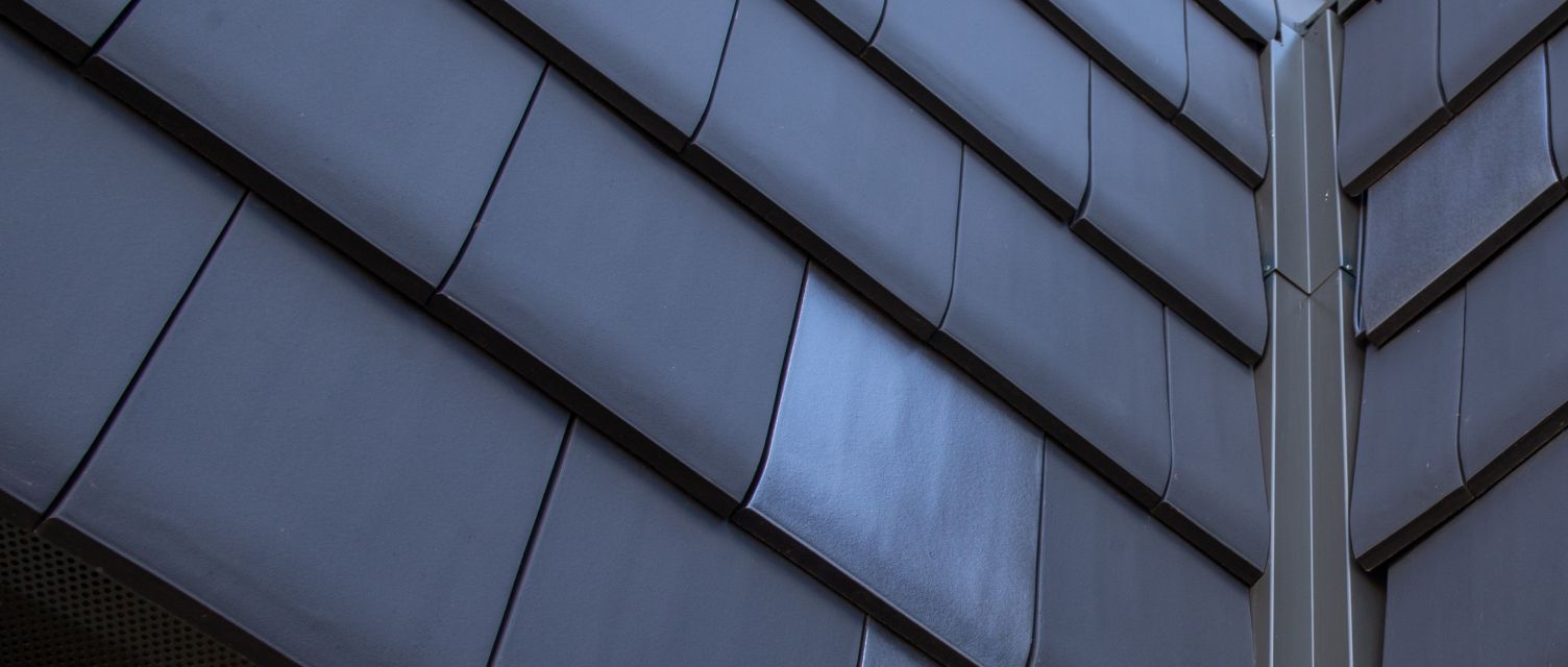 Bardage en façade avec de la tuile HP 10 Huguenot Edilians